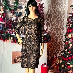 Beautiful lace cocktail with nude lining